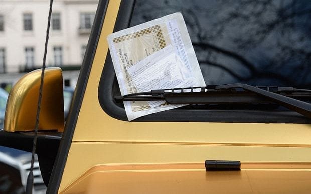 A parking ticket placed on a 6x6 Mercedes G 63 from Saudi Arabia, which is one of three gold cars parked on Cadogan Place in Knightsbridge, London. PRESS ASSOCIATION Photo. Picture date: Wednesday March 30, 2016. See PA story TRANSPORT Knightsbridge. Photo credit should read: Stefan Rousseau/PA Wire
